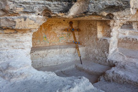 Photo for Orthodox cross inside of rock side monastery . Cross religious symbol - Royalty Free Image