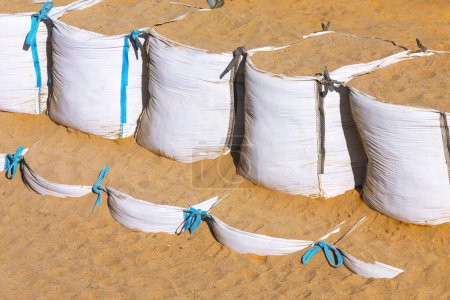 Sand bags on the beach .Sandy bag dam