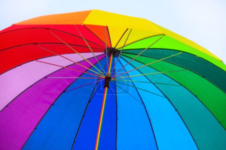 Photo for Colorful umbrella in the park. Close up of rainbow umbrella - Royalty Free Image