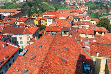 Aerial view of the old town with red tiled roofs. Bergamo town view from above