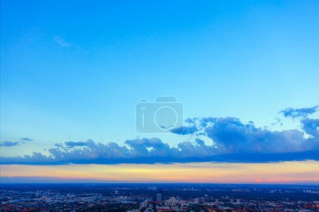 Beautiful sunset over the city of Munich, Germany. Cityscape panorama with twilight