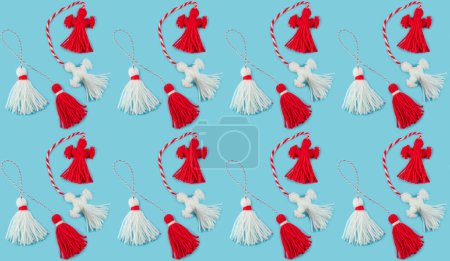 Photo for Traditional Martisor - symbol of holiday 1 March, Martenitsa, Baba Marta, beginning of spring and seasons changing in Romania, Bulgaria, Moldova. Greeting and post card for holidays. Blue background. Pattern - Royalty Free Image