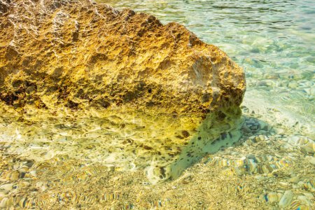 A huge stone on the shore of the Ionian Sea