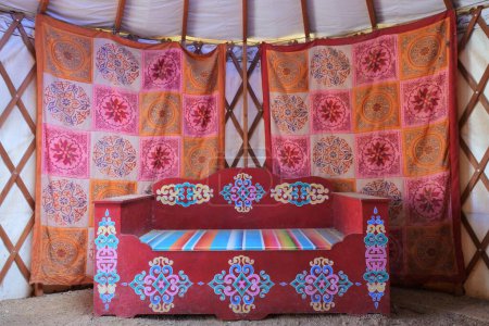 Living room of a a traditional Mongolian yurt ger a portable, round tent covered and insulated with skins or felt and traditionally used as a dwelling by nomadic groups in Central Asia Mongolia.