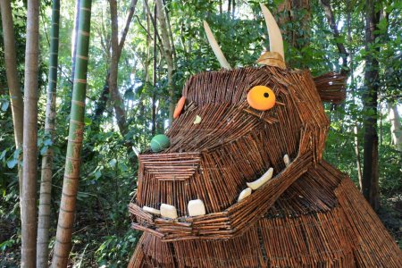 Photo for YANDINA, QLD - APR 13 2023:Gruffalo monster in the woods. Gruffalo book has sold over 13 million copies won several prizes for children's literature and even an Oscar nominated animated film. - Royalty Free Image