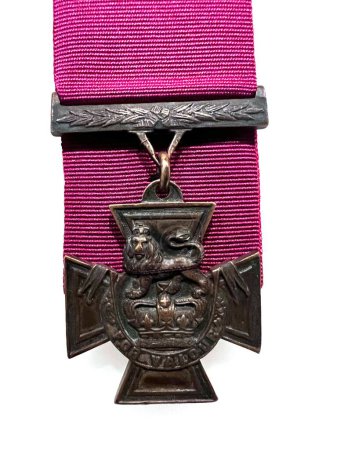 Photo for CANBERRA - MAR 14 2023:The Victoria Cross Medal, the highest and most prestigious decoration of the British Armed Forces  honours system.It is awarded for valour "in the presence of the enemy". - Royalty Free Image