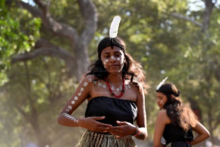 Photo for LAURA,QLD - JULY 08 2023:Indigenous Australians women during ceremonial dance in Laura Quinkan Dance Festival Cape York Australia. Ceremonies combine dance, song, rituals, body decorations and costumes - Royalty Free Image