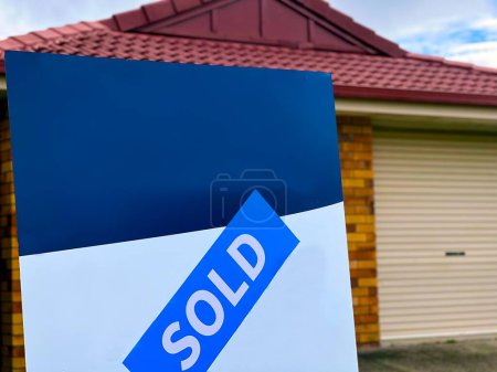 Photo for BRISBANE - NOV 19 2023:Sold residential house in Brisbane Queensland Australia.The median dwelling price for Australia now sits at $765,762 Australian dollar. - Royalty Free Image