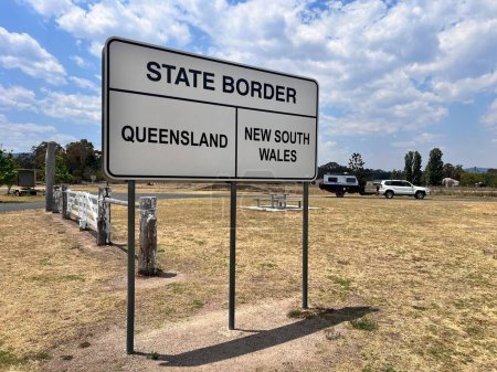 Photo for WALLANGARRA, QLD - OCT 30 2023:The state border sign between New South Wales and Queensland, Australia.Wallangarra is on the Queensland side of the border and Jennings is on the New South Wales side. - Royalty Free Image