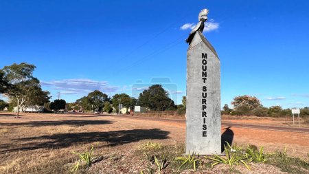 Photo for MOUNT SURPRISE, QLD - JULY 22 2023:Mount surprised township entrance road sign in Queensland, Australia.The town is located in the Gulf Savannah in Far North Queensland with population of 169 people. - Royalty Free Image