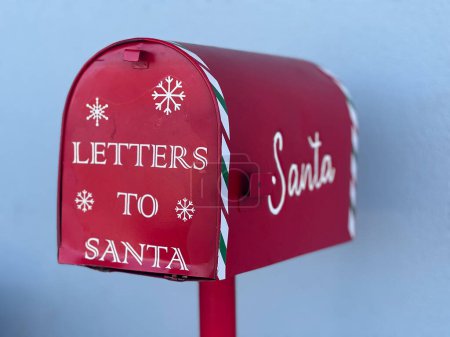 Photo for Letters to Santa Claus mail box.Santa is a legendary figure in Christian culture who is said to bring gifts during the late evening and overnight hours on Christmas Eve. - Royalty Free Image