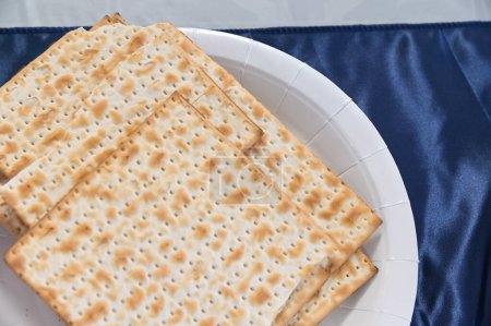 Photo for Matzah Unleavened flatbread in Jewish cuisine; an element of the Passover festival - Royalty Free Image