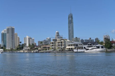 Photo for Luxury house on Nerang river against Surfers Paradise skyline the Gold Coast's entertainment and tourism centre. - Royalty Free Image