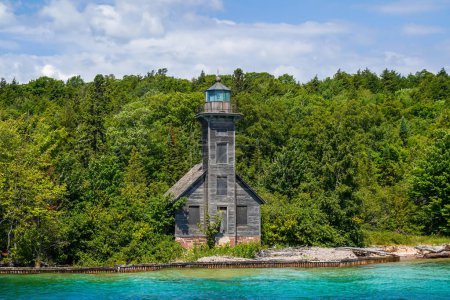Photo for The Grand Island East Channel Light is a lighthouse located just north of Munising, Michigan. Constructed of wood, the light first opened for service in 1868 - Royalty Free Image