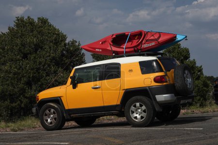 Photo for COLORADO SPRINGS, COLORADO - AUGUST 10, 2021: Toyota 4runner TRD loaded with kayaks in Colorado Springs, Colorado - Royalty Free Image
