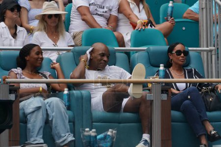 Photo for MIAMI GARDENS, FLORIDA - APRIL 1, 2023: Milan Tyson, Mike Tyson and Lakiha Spicer attend the women's singles final match at 2023 Miami Open at the Hard Rock Stadium, Miami Gardens, Florida, USA - Royalty Free Image