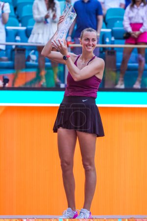Photo for MIAMI GARDENS, FLORIDA - APRIL 1, 2023: Petra Kvitova of Czech Republic poses with the champions trophy after defeating Elena Rybakina in the women's singles final match at 2023 Miami Open - Royalty Free Image