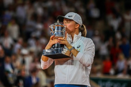 Photo for PARIS, FRANCE - JUNE 4, 2022: 2022 Roland Garros Champion Iga Swiatek of Poland during trophy presentation after her victory over Coco Gauff at Court Philippe Chatrier in Paris, France - Royalty Free Image