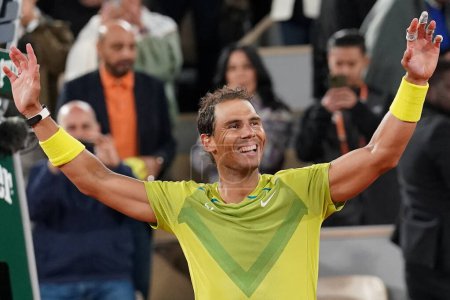 Photo for PARIS, FRANCE - MAY 31, 2022: Grand Slam champion Rafael Nadal of Spain celebrates victory after his quarter-final match against Novak Djokovic of Serbia at 2022 Roland Garros at Court Philippe Chatrier in Paris, France - Royalty Free Image