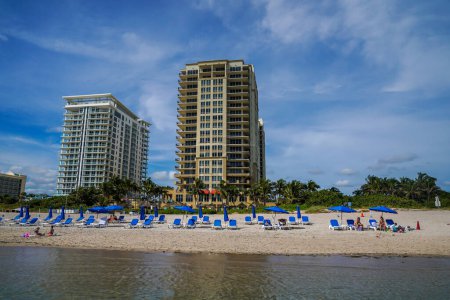 Photo for RIVIERA BEACH, FLORIDA - NOVEMBER 15, 2022: Luxury condominiums at Singer Island, Fl. Singer Island an oceanfront neighborhood part of the city of Riviera Beach with natural beaches and upscale hotels - Royalty Free Image