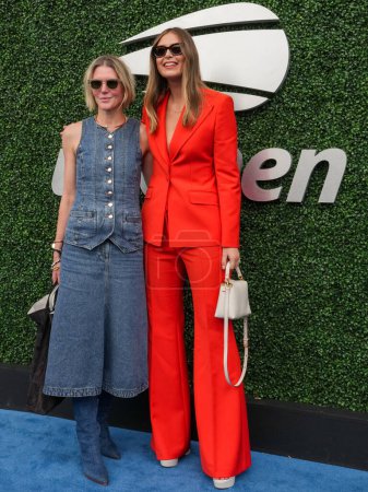 Photo for NEW YORK - AUGUST 28, 2023: Gabriela Hearst (L), a women's luxury ready-to-wear and accessories designer, and the former tennis player Maria Sharapova on the blue carpet before 2023 US Open opening night ceremony at USTA National Tennis Center in NY - Royalty Free Image