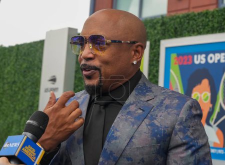 Photo for NEW YORK - AUGUST 28, 2023: Daymond John, Business Entrepreneur and Co-star of ABC's Hit show Shark Tank, at the blue carpet before 2023 US Open opening night ceremony at National Tennis Center in NY - Royalty Free Image