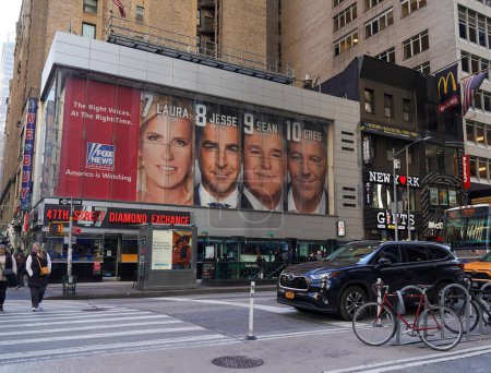 Photo for NEW YORK - NOVEMBER 2 , 2023: Fox News Channel billboard posted at the corner of 6th Avenue and 47th Street in New York. Fox Corporation is an American multinational mass media company - Royalty Free Image