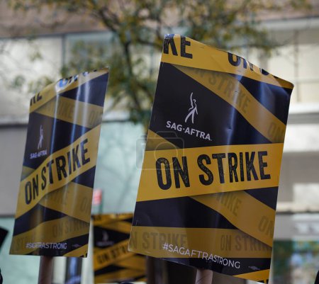 Photo for NEW YORK - NOVEMBER 2, 2023: SAG-AFTRA members walk a picket line in front of NBC Studios in Midtown Manhattan, as 160,000 members of SAG-AFTRA continue strike - Royalty Free Image