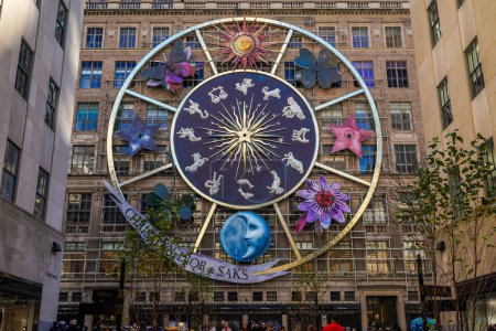 Photo for NEW  YORK - NOVEMBER 2, 2023: Saks and Dior Team for Holiday Extravaganza Creating Dior's Carousel of Dreams at Saks Fifth Avenue with a 10-story giant zodiac in Midtown Manhattan, New York - Royalty Free Image