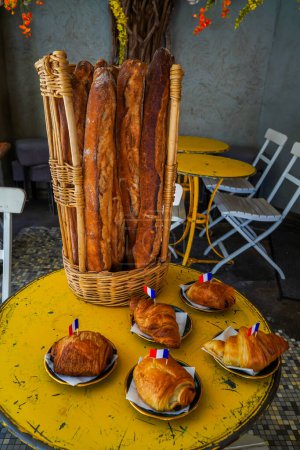 Photo for Baguettes,  croissants and pain au chocolat in French cafe - Royalty Free Image