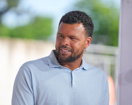 Photo for PARIS, FRANCE - MAY 29, 2023: French former professional tennis player and Eurosport analyst Jo-Wilfried Tsonga comments match at 2023 Roland Garros in Paris, France - Royalty Free Image