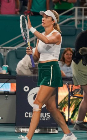 Photo for MIAMI GARDENS, FLORIDA - MARCH 28, 2024: Danielle Collins of United States celebrates victory after semi-final match against Ekaterina Alexandrova of Russia at 2024 Miami Open at the Hard Rock Stadium in Miami Gardens - Royalty Free Image