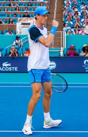 Photo for MIAMI GARDENS, FLORIDA - MARCH 31, 2024: Jannik Sinner of Italy in action during men's singles final match against Grigor Dimitrov of Bulgaria at 2024 Miami Open at the Hard Rock Stadium in Miami Gardens - Royalty Free Image