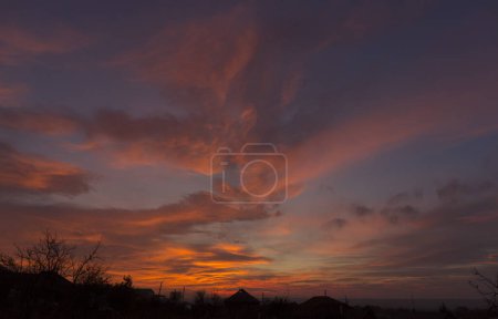Téléchargez les photos : Landscape at sunset. Tragic gloomy sky. Panorama. Crimson twilight. - en image libre de droit
