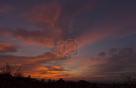 Téléchargez les photos : Landscape at sunset. Tragic gloomy sky. Panorama. Crimson twilight. - en image libre de droit