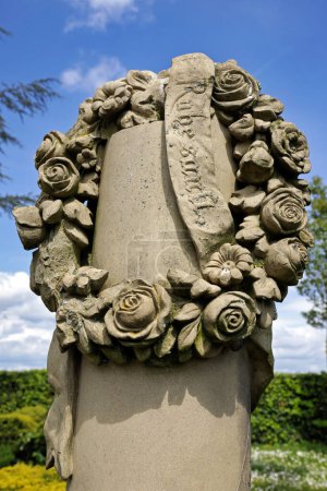 gravestone with stone wreath