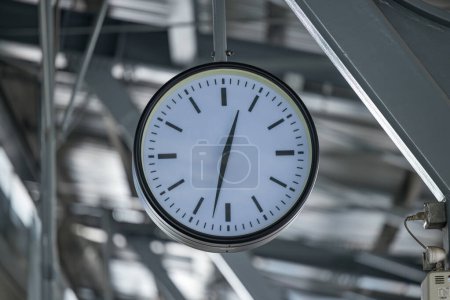 Photo for Clock at subway station. Large clock face public transport on a train station platform. Analog clock in public metro subway station or metro train platform. - Royalty Free Image