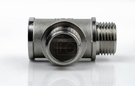 Foto de Chrome plated tee pipe fitting 1/2". Tee pipe T adapter. Isolated on white background. - Imagen libre de derechos