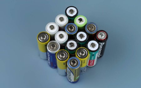 Photo for Kyiv, Ukraine - May 20, 2023: used and damaged primary and  secondary batteries from different manufacturers. Selective focus - Royalty Free Image