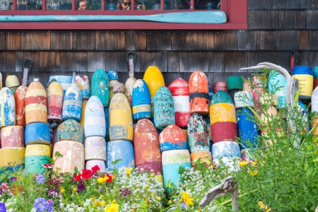 Rockport, USA - August 11, 2019:colorful floats piled up in the streets of Rockport during a sunny day