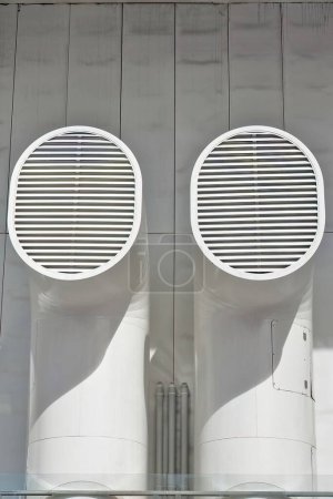 Photo for Pair of white-painted cowl air vents for boat deck used to provide ventilation and allow air to flow in and out of the ships. Australian National Maritime Museum-Darling Harbour-Sydney-NSW-Australia. - Royalty Free Image