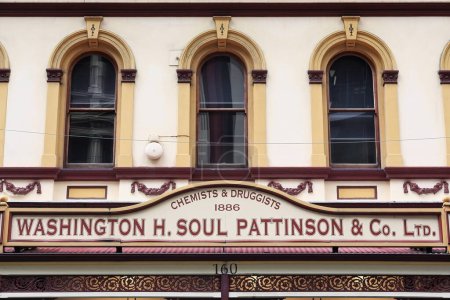 Photo for Facade detail of the heritage-listed Soul Pattinson building dating from AD 1886 with signboard displaying the store owner's name on the awning at the entrance to the building. Sydney-NSW-Australia. - Royalty Free Image