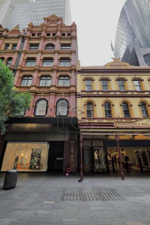 Photo for Sydney, Australia-October 16, 2018: Facades that face Pitt Street Mall of the heritage-listed, AD 1886 built Soul Pattinson building with posted awning, and the old section of the Glasshouse building with cantilevered awning. - Royalty Free Image