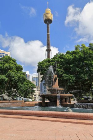 Photo for J.F.Archibald Memorial Fountain in Hyde Park by Francois-Leon Sicard placed in 1932 depicting Apollo on top, Theseus and Minotaur on left, Diana on right. Tower Eye background. Sydney-NSW-Australia. - Royalty Free Image