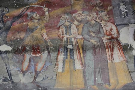 Photo for Permet, Albania-April 17, 2019: Saint Mary's Church of Leusa dates from the 18th century, built on older Byzantine-era remains. Wall paintings from 1812 depicting Bible scenes, unidentified characters - Royalty Free Image