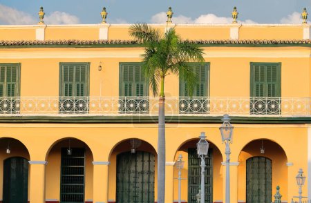 Trinidad, Cuba-October 13, 2019: Southwest facing facade of the AD 1812 built, Neoclassical former Palacio Brunet Palace on the northwest side of the Plaza Mayor Square, now the Museo Romantic Museum.