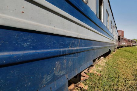Trinidad, Cuba-October 14, 2019: Trains stopped at the train station, including the touristy Valle de los Ingenios-Sugar Mills Valley historic train, in the early morning prior to its everyday trip.