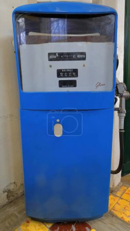 Photo for Santa Clara, Cuba-October 14, 2019: Vintage, blue fuel dispenser model 1006 from the 1960s, Cuban version with lettering in Spanish and still showing the amount and price of the last gallons dispensed - Royalty Free Image