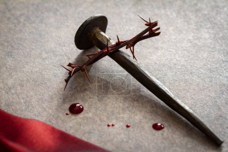 Photo for Cross made of old nail and thorn, drops of blood, red robe. Jesus Christ Crucifixion abstraction, Good Friday, religious background - Royalty Free Image