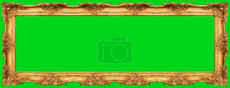 Photo for Long golden picture frame isolated on green chroma key background. - Royalty Free Image